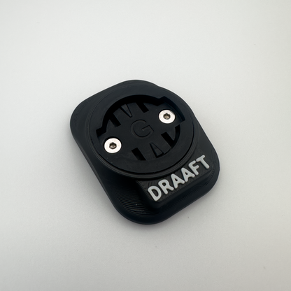 Black device with 'DRAAFT' branding on a light gray background