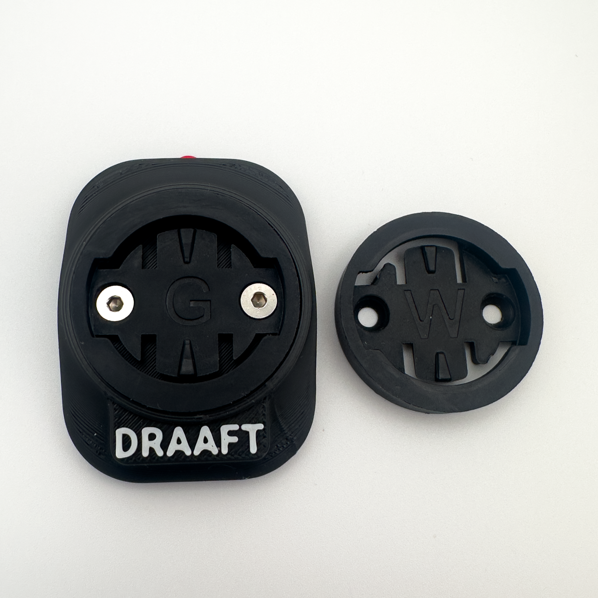 Two black bike mount accessories with 'DRAAFT' branding on a white background
