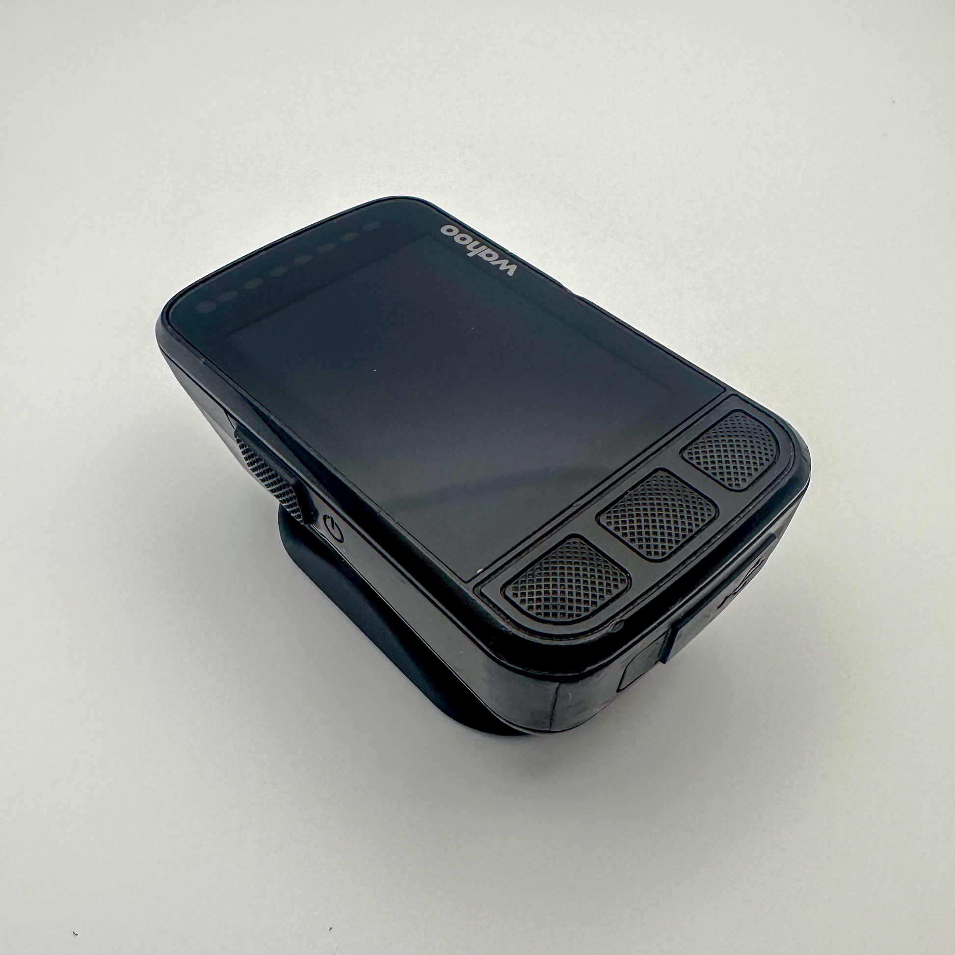 Black device with a screen on a white background