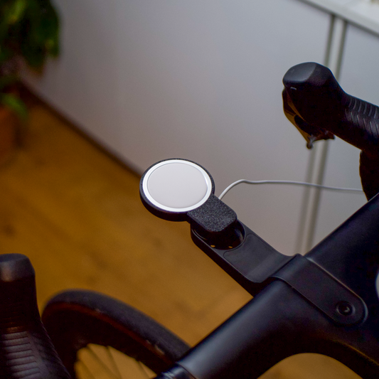 Close-up of a bicycle handlebar blurred background